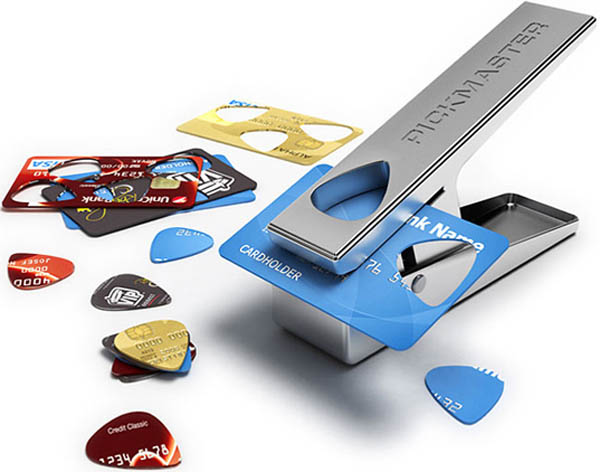 stamping old credit cards into guitar picks
